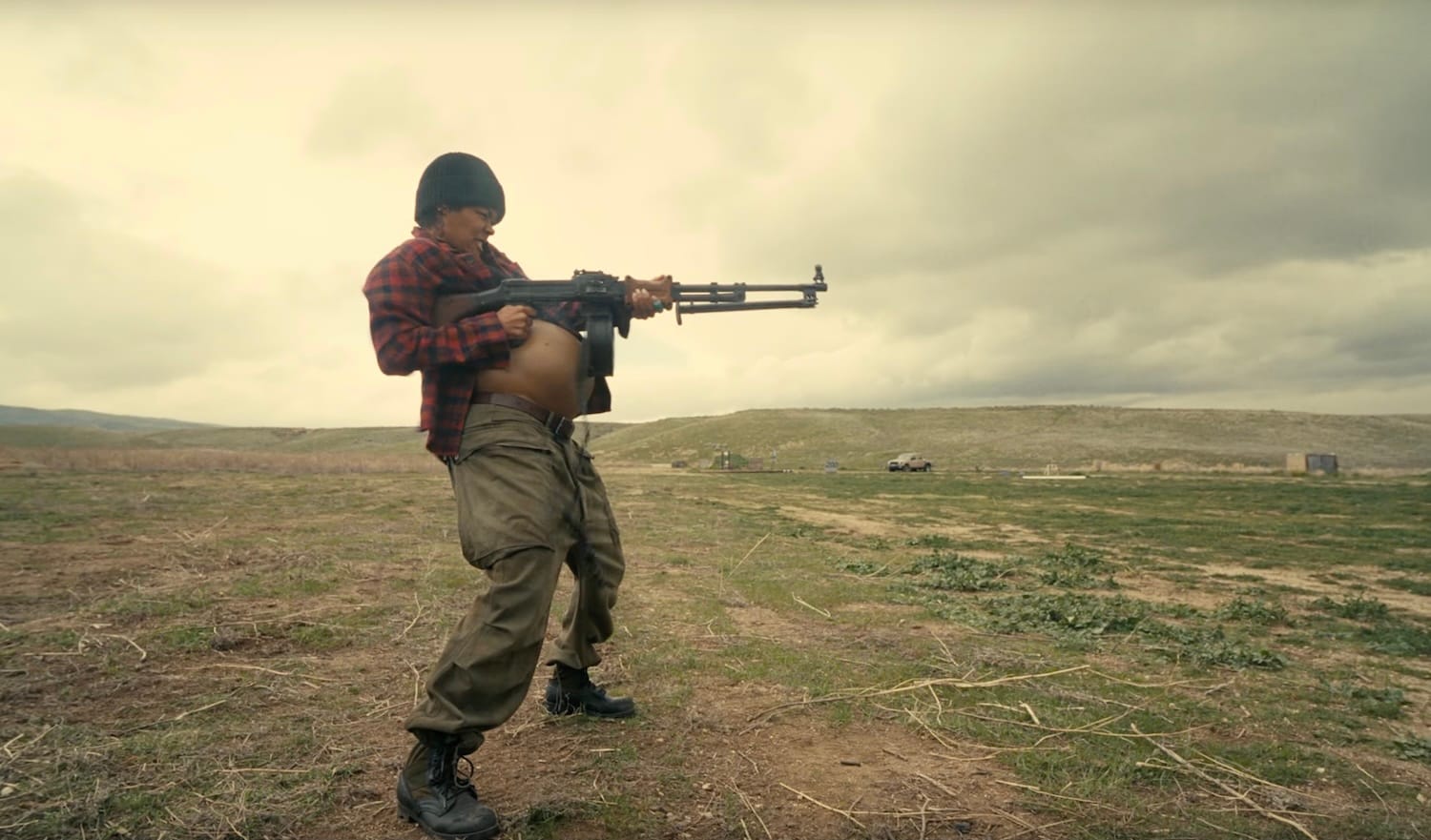 Teyana Taylor takes a little target pratice in Paul Thomas Anderson's ONE BATTLE AFTER ANOTHER.